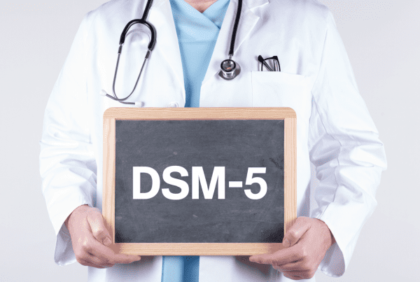 Clinician review the changes from the March 2022 DSM-5 text revision